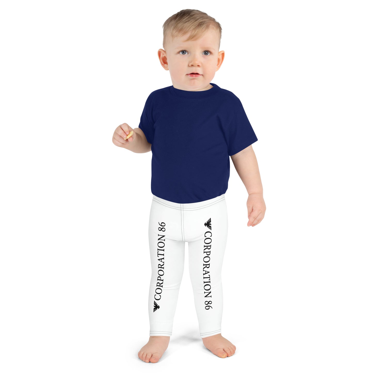Leggings per bambini CORPORATION-86 con stampa all-over bianca, visibili in primo piano, tessuto morbido e comodo.