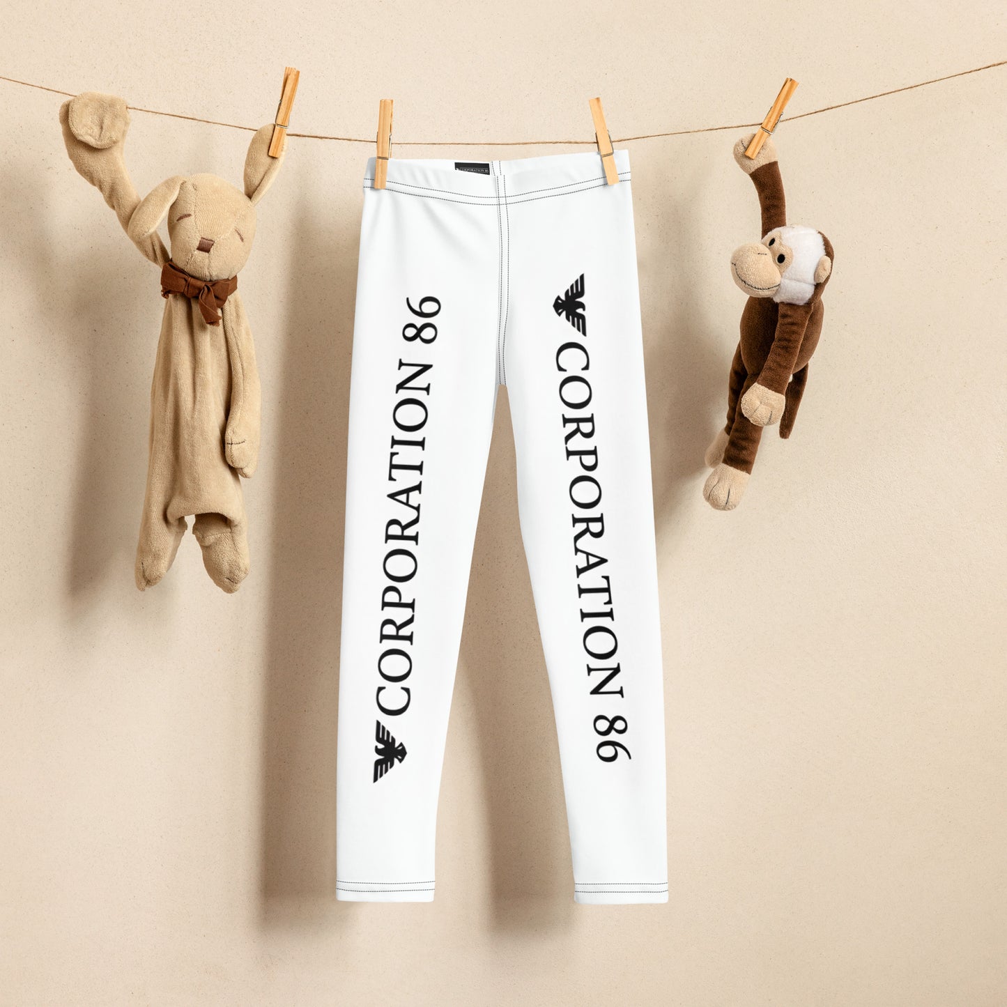 Leggings per bambini CORPORATION-86 con stampa a fantasia, tessuto bianco e motivo colorato, visualizzate dalla parte anteriore