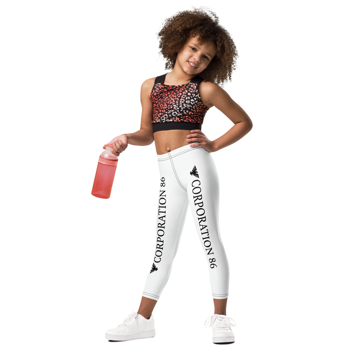 Leggings per bambini CORPORATION-86 con stampa a fantasia bianca, vista frontale sinistra, tessuto comodo e colorato